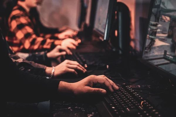 Players filling the main rows of gaming stations at COMBO